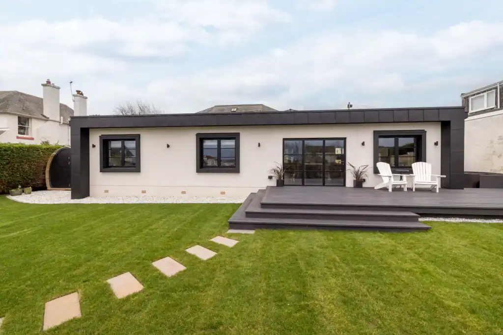 Contemporary Extension and Extensive Renovation with Zinc Cladding